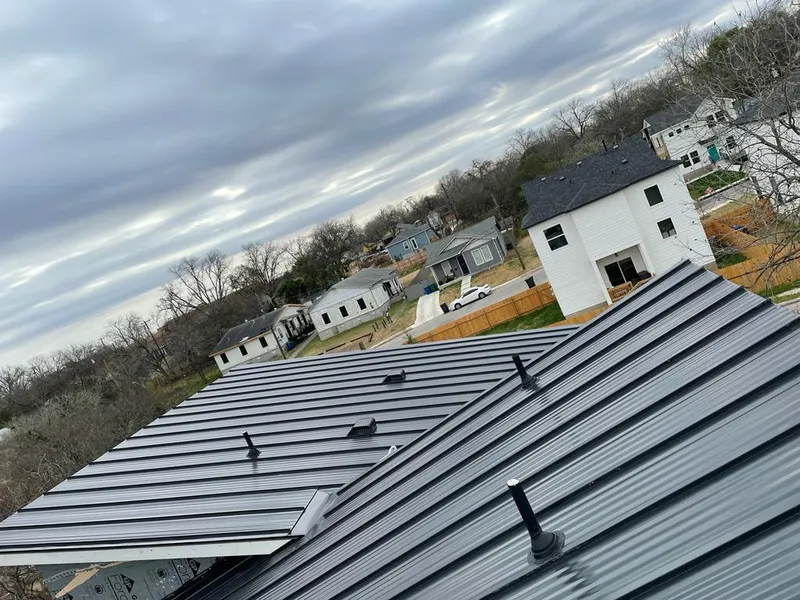 Standing seam metal roof panels with vents for Skylight Repair in Worthington